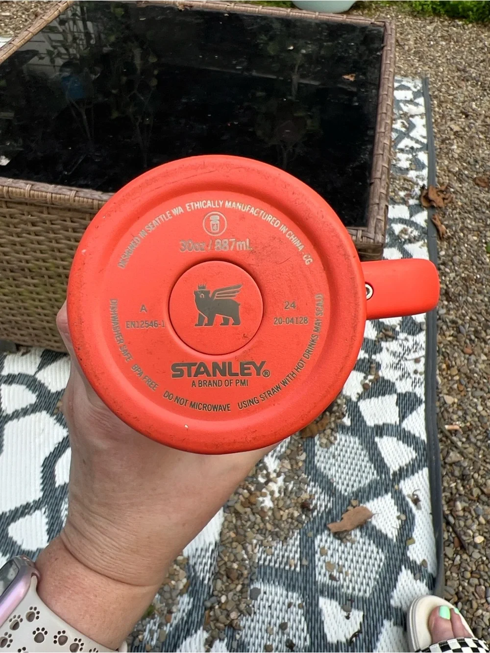 Bright orange with pink Stanley 30oz